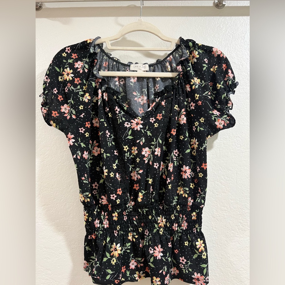 Black floral top with V-neck